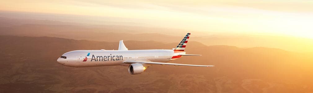american-plane-flying-sunset.jpg