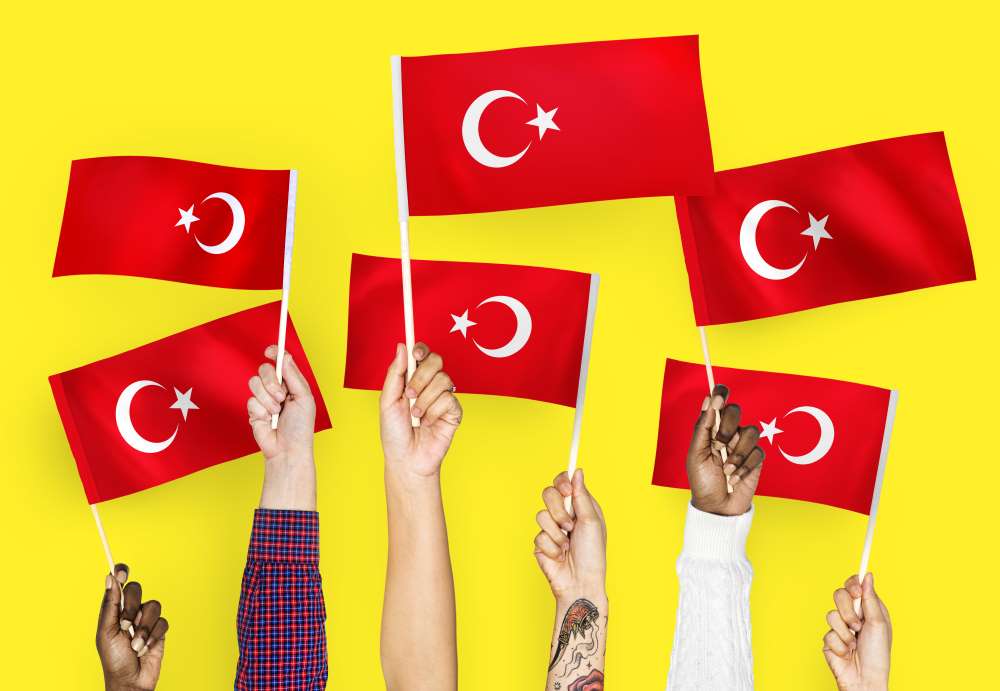hands-waving-flags-of-turkey